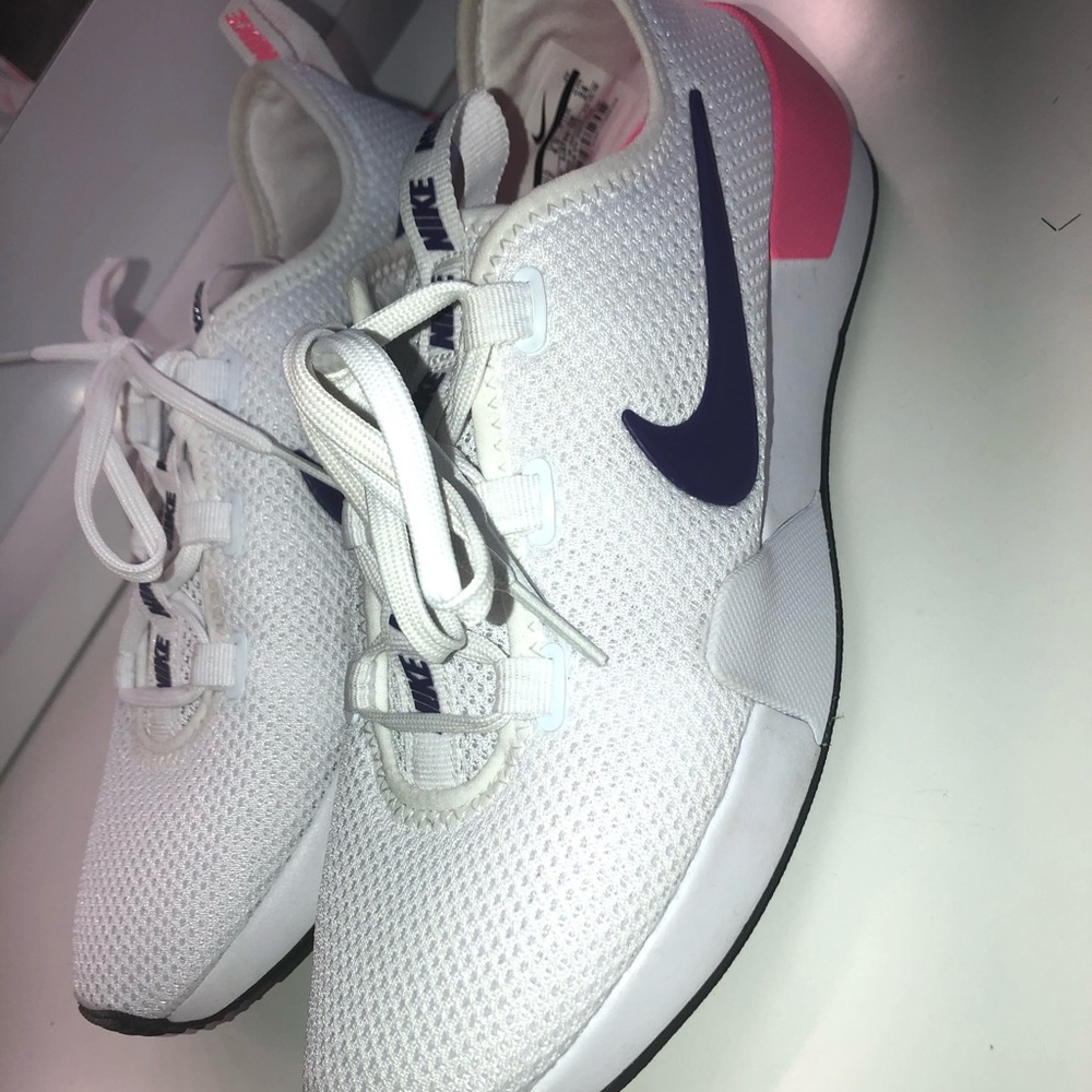 Pink white and purple Nike’s